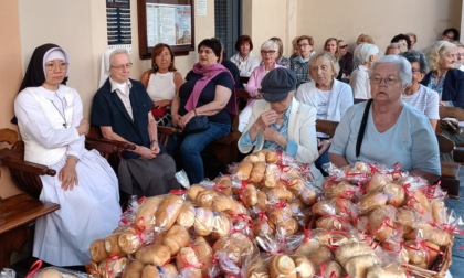 Santa Marta a Lecco: solenne celebrazione e distribuzione dei “michett” simbolo di condivisione